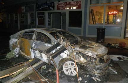 June 2013 crash on Erie Street: . In June 2013, Satisha Cleckley and her daughter— along with three other passengers— narrowly escaped injury when the rental car Cleckley was driving was struck by a pole as they drove by. BPD photo
